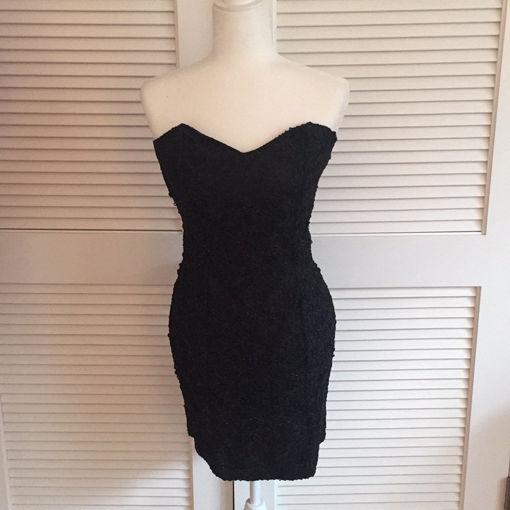 Cocktail dress shown with RAFE evening bag